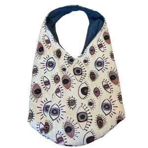 Evil Eye Bindle Tote herringbone bag by French Designer Sophie Peirani Createur